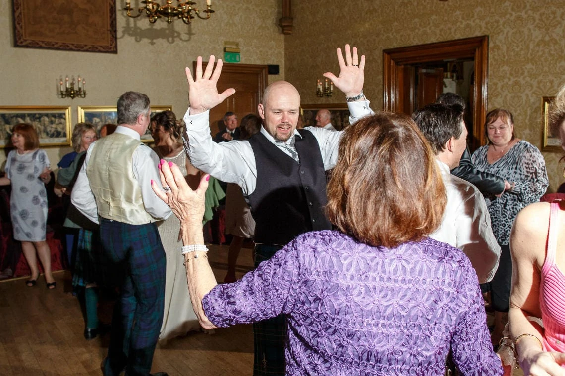 dancing during evening reception in the Sir Alexander Room