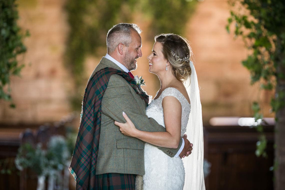 newlyweds Emma and Gary in Dunglass Church