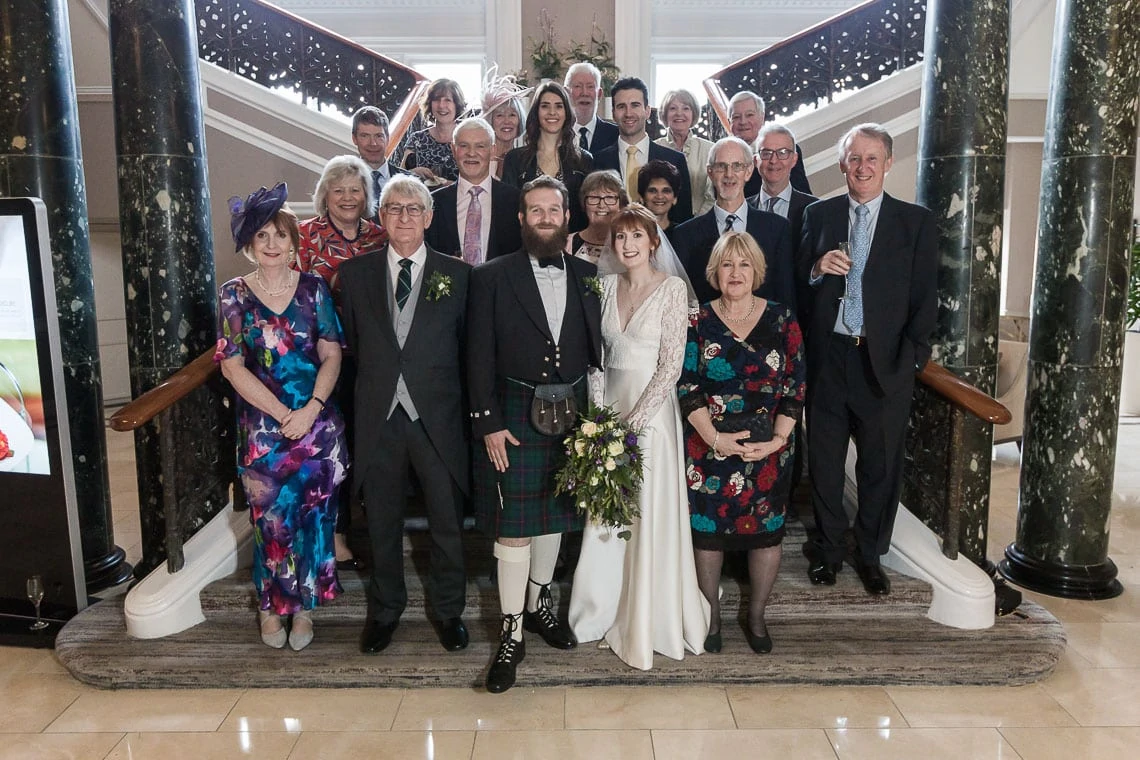 wedding group photo on the grand staircase