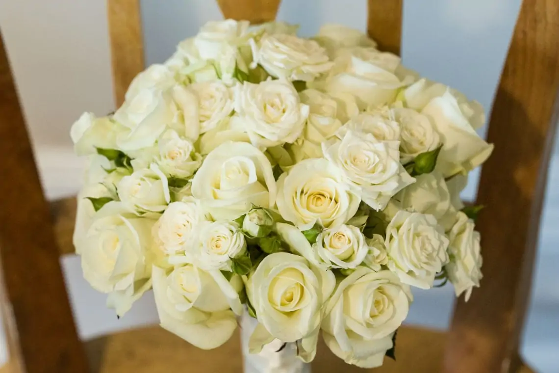 Detailed photo of bouquet of white roses