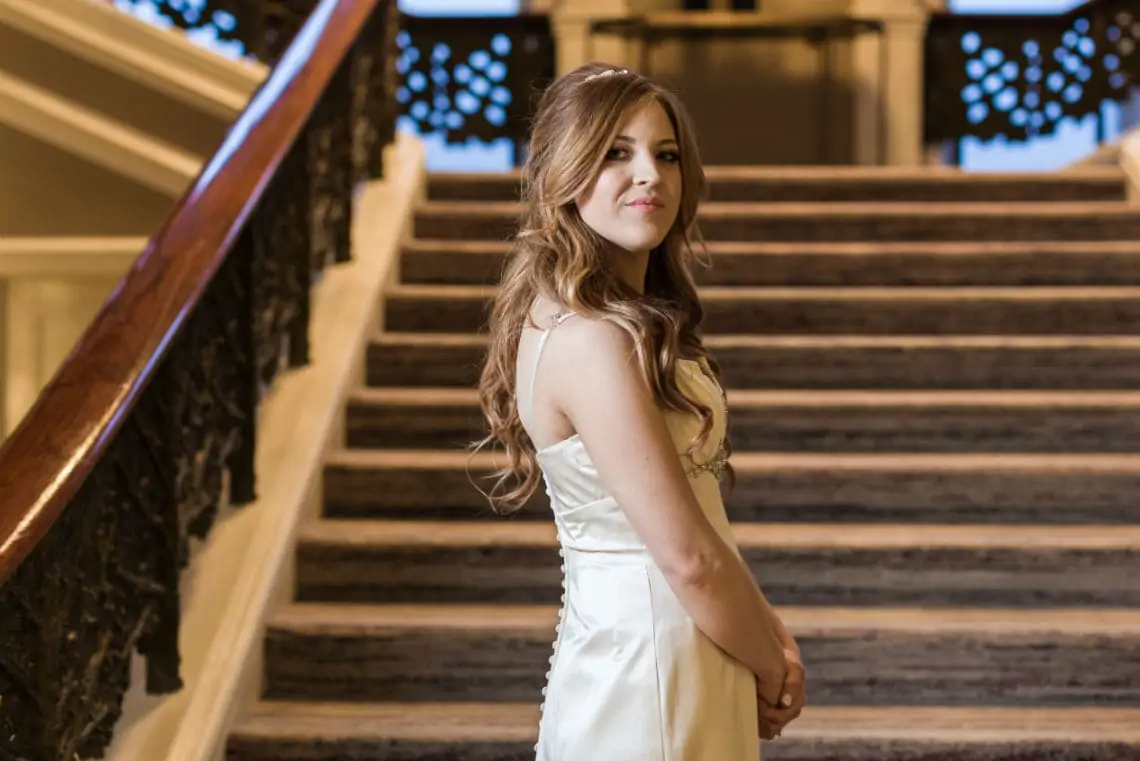 Bridal portrait with grand staircase in the background