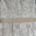 detailed photo of lace on wedding dress