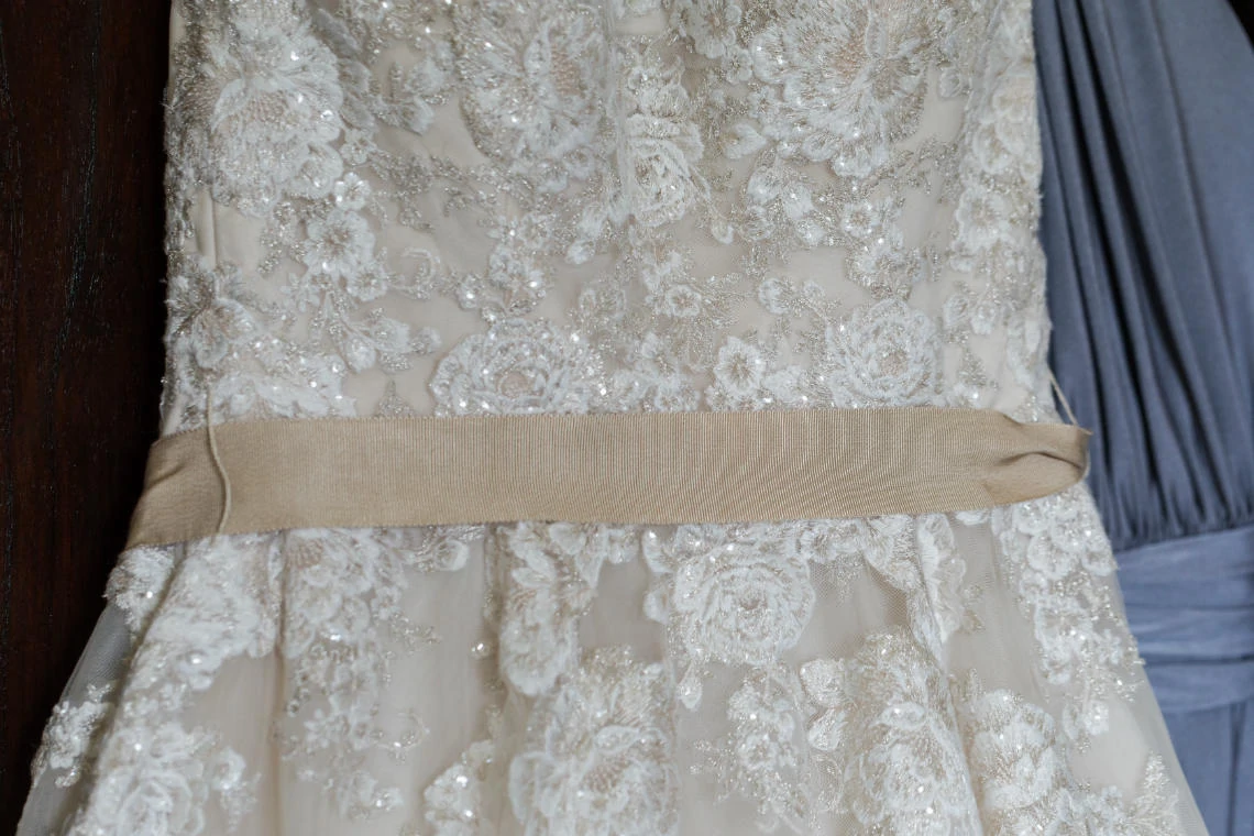 detailed photo of lace on wedding dress