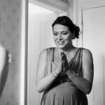 black and white photo of bridesmaid smiling