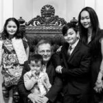 black and white photo of family at wedding
