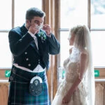 photo of groom drinking from the quaich