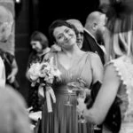 bridesmaid smiling during champagne reception