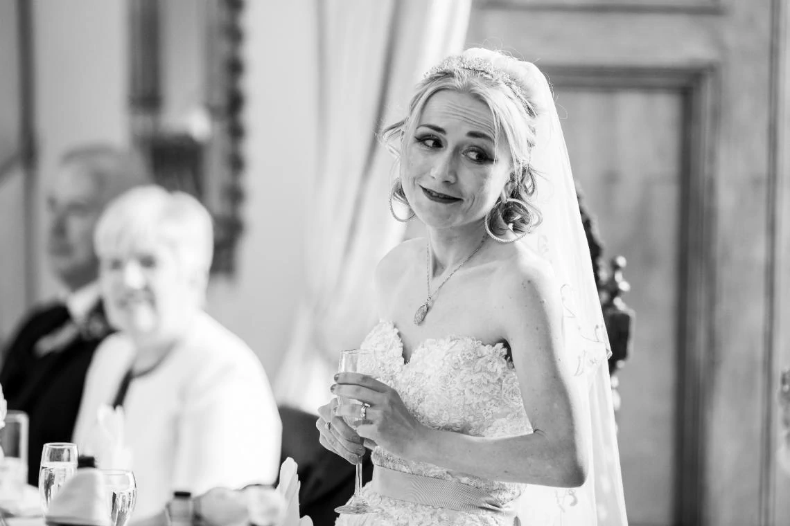 Wedding at Dalhousie castle photo of bride during speech