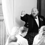 best man doing speech during wedding reception
