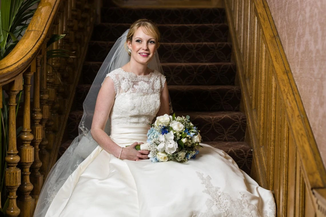 bride sitting on the staircase