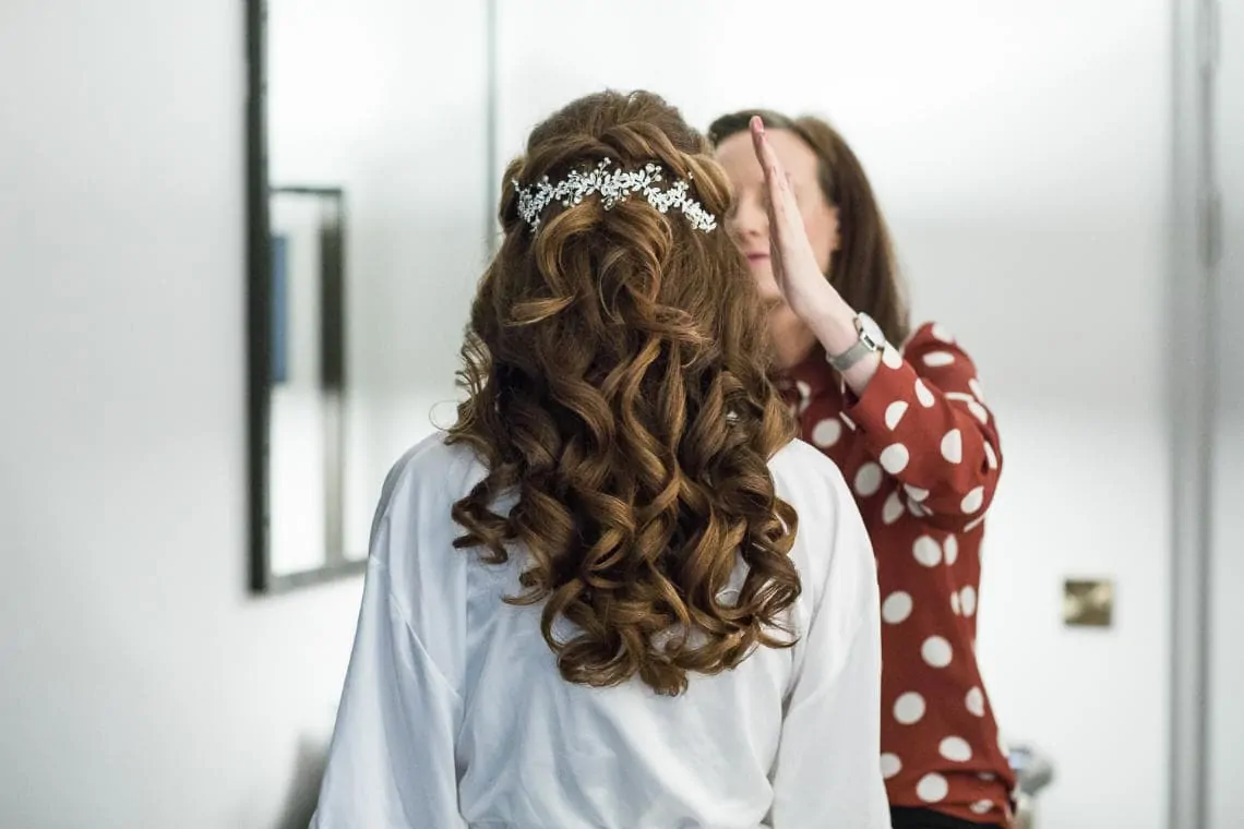 bridal hair viewed from the rear during makeup session