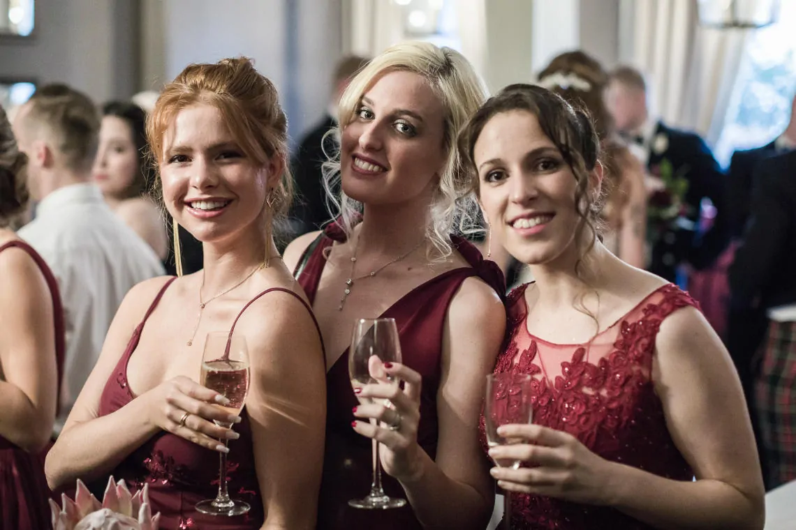 bridesmaids enjoying champagne in the Library