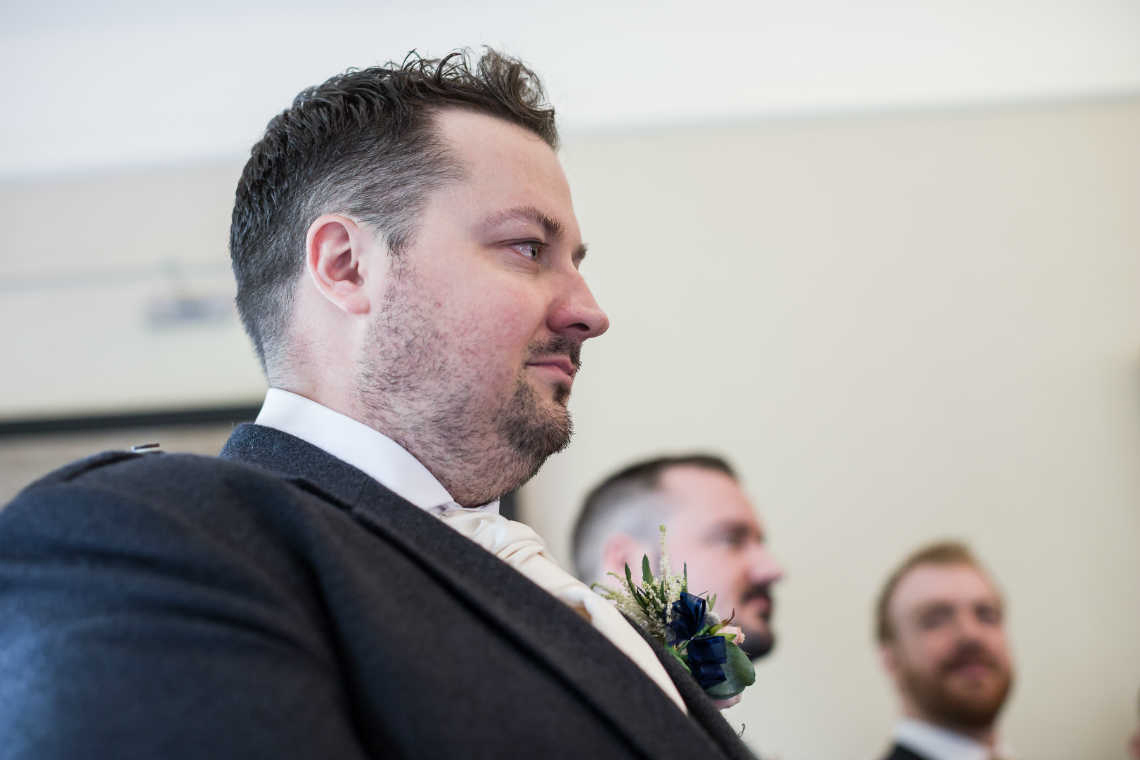 groom shows emotions during humanist wedding ceremony