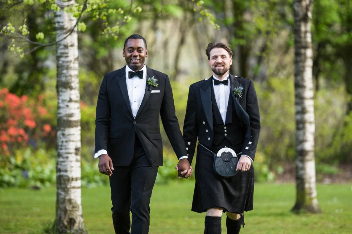 same-sex newly-weds in Princes Street Gardens