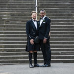 wedding at Waldorf Astoria Edinburgh same-sex newly-weds in Princes Street Gardens